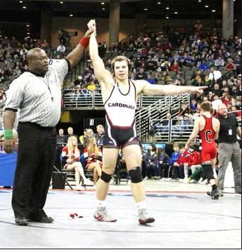 The referee raised Noah Scott’s arm signalling victory in Saturday’s State Championship match in Omaha. Scott became the 12th Randolph wrestler to earn a state title.
