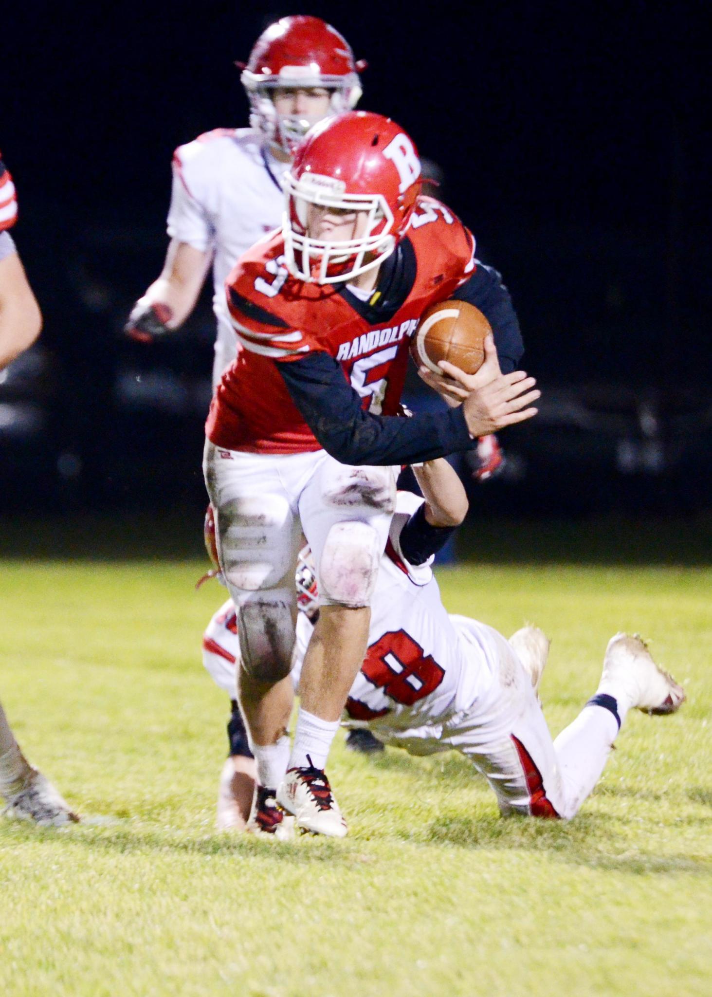 Randolph&#039;s Carter Schnoor breaks loose from a Plainview defender and heads downfield