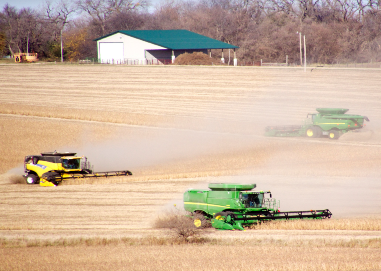 Friends and neighbors of Mike and Lisa Nissen’s family gathered Monday to help Mike bring in his soybean harvest.