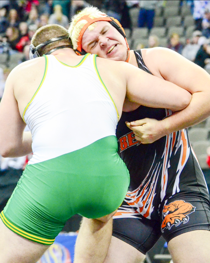 he Bears’ Ethan Williams and Fremont Bergan’s Peyton Cone work to earn control as they battle for a takedown during action in their quarterfinal match at last week’s State Tournament in Omaha. The Archbishop Bergan wrestler was able to out-last Williams for an 8-7 decision in the contest.