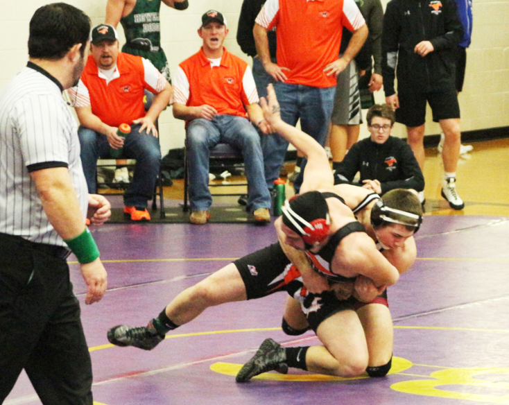 Noah Scott tries to keep his foe from escaping during action at the Battle Creek Wrestling Invite on Saturday.